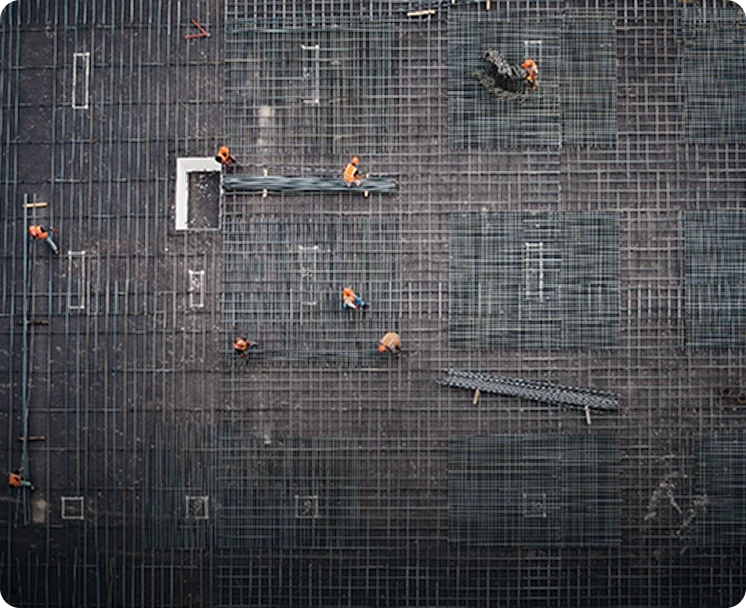 Overhead photo of workers on a construction side.